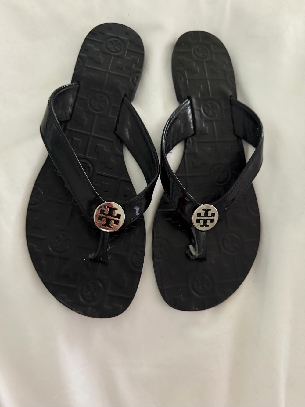 Tory Burch Black Patent Logo Thong Sandals with Silver Medallions